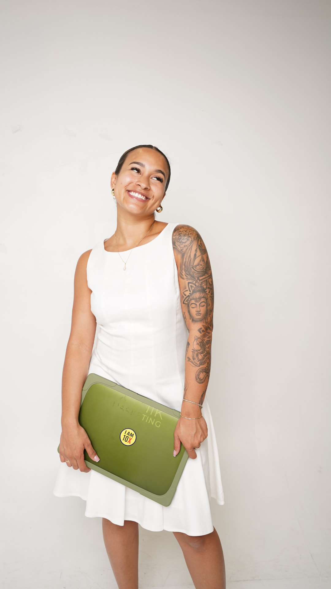 Kaila Raymond holding an Ikonik laptop