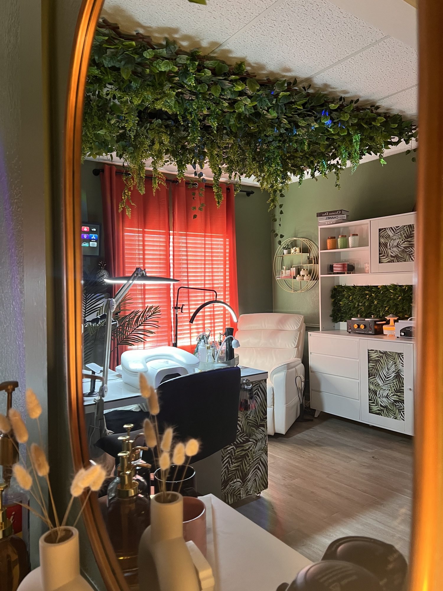 Beauty suite interior with hanging greenery